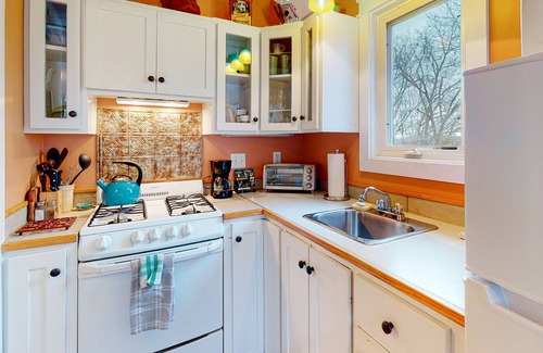 Sylvan Shores Cabaña | Peaceful wooded cottage with seasonal lake views, WiFi, private parking, & patio