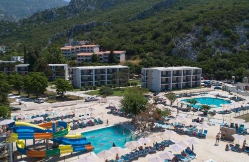 Canj Hotel | PEARL BEACH RESORT - Hills & Villas