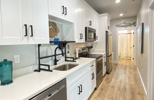 Port St. Joe Cabaña | "Pelican Cottage" is a pet friendly, 2 bed, 1 1/2 bath unit accepting 5 guests. Pool Coming 2025!