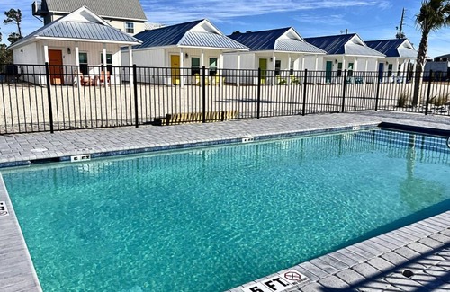 Port St. Joe Cabaña | "Pelican Cottage" is a pet friendly, 2 bed, 1 1/2 bath unit accepting 5 guests. Pool Coming 2025!