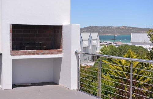 Langebaan Casa | Pelican Cove is a Modern 4-Bedroom Holiday Home in Langebaan with some Sea Views