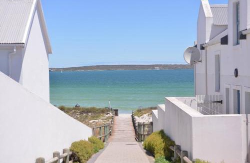 Langebaan Casa | Pelican Cove is a Modern 4-Bedroom Holiday Home in Langebaan with some Sea Views