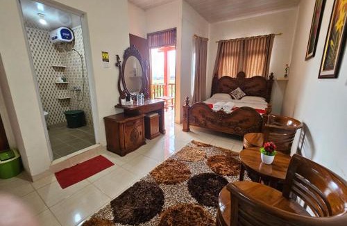 Kamang Magek Casa | Penginapan Bunga Sonsang kamar Family Tripel