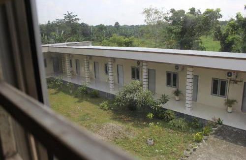 Medan Casa | Penginapan Transit Tomato