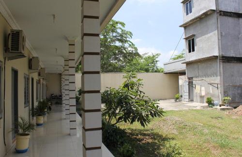 Medan Casa | Penginapan Transit Tomato