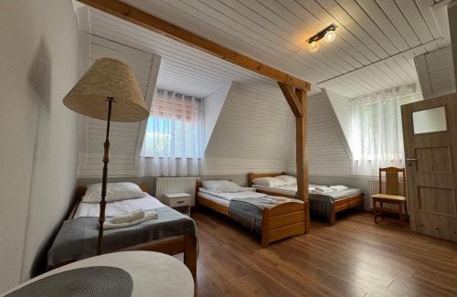 Ostrowin Casa | Pensjonat nad Stawami