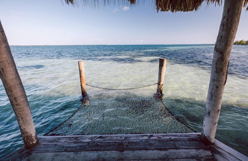 Thatch Caye Complejo | Penthouse Oceanfront Cabana w/ Private Ocean-Facing Balcony & Amazing Views