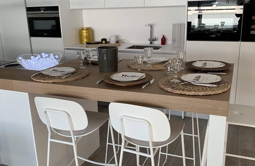 Platja d'Aro Apartamento | En la playa de Playa de Aro, nuevo apartamento con aire acondicionado, azotea, piscina.