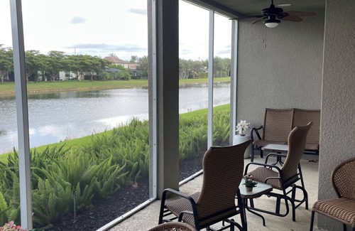 Rural Estates Condominio | Perfect 2-bedroom 1st floor condo, with scenic lake view in charming Naples Fl.