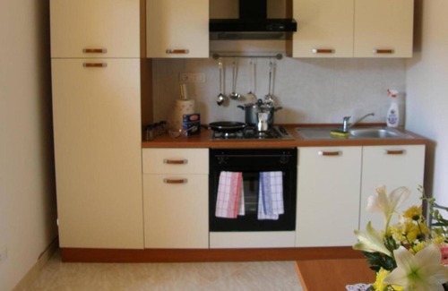 Fluminimaggiore Casa | Apartamento "Residence Pianeta Sardegna 2" con piscina, aire acondicionado y jardín