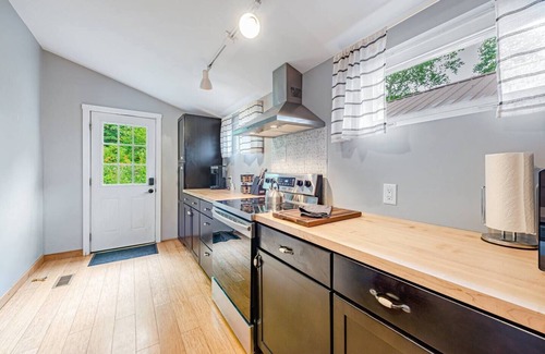 Ligonier Casa | Pet Friendly Creekside Cabin at Darlington Fish and Swim from the Back Yard!