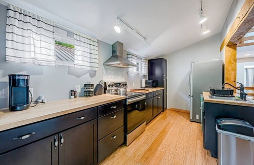 Ligonier Casa | Pet Friendly Creekside Cabin at Darlington Fish and Swim from the Back Yard!