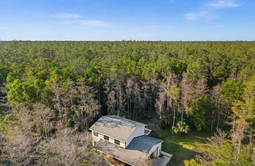 Rural Estates Casa | Pet friendly, peaceful retreat on over 2 wooded acre in beautiful Naples Florida