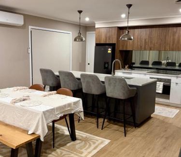 Karaka Casa | Pet Friendly Riverfront Minimalist Karaka Stay Prime Location