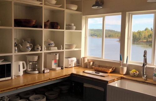 Calais Casa | Pet Friendly Waterfront Farmhouse- PVT OFC, Views, Kayaks, Game Room & Playset
