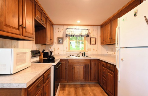 Raymond Cabaña | Pet-friendly waterfront cottage just 26' from the shore of Panther Pond!