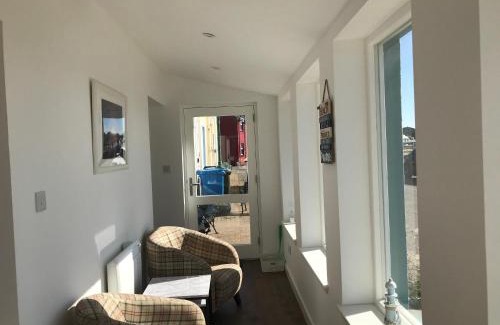 Portmahomack Casa | PetFriendly-Beachfront-SunsetFacingSunPorch-Garden