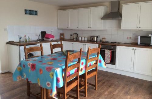 Portmahomack Casa | PetFriendly-Beachfront-SunsetFacingSunPorch-Garden