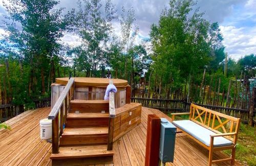 San Cristobal Casa | Petite Log Cabin on Organic Farm in New Mexico