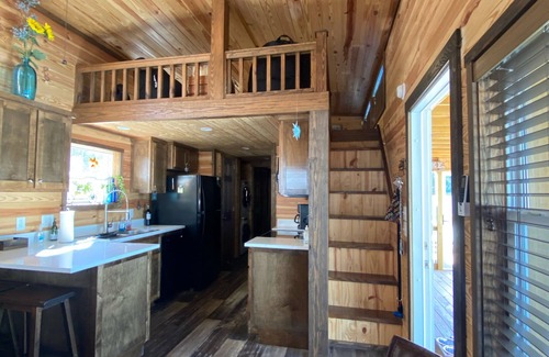 New London Casa | Phoenix Tiny House at Badin Shores Resort, lake view, porch, pool, beach, marina