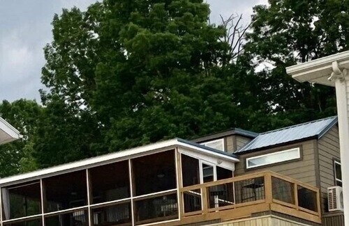 New London Casa | Phoenix Tiny House at Badin Shores Resort, lake view, porch, pool, beach, marina