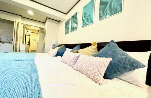 Maeganeku Apartamento | PiAプリンスプラージュ沖縄 海の見える高層階