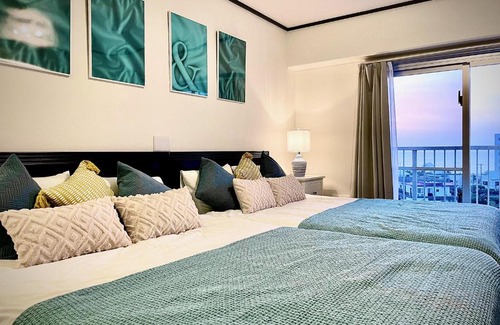 Maeganeku Apartamento | PiAプリンスプラージュ沖縄 海の見える高層階