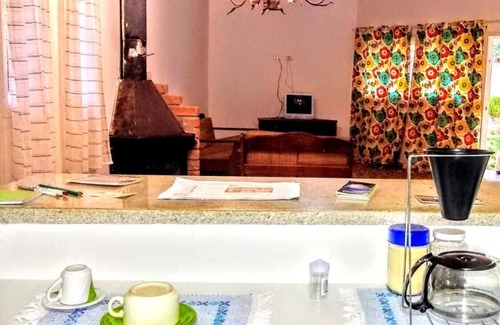Mairipora Cabaña | Acogedora casa amarilla