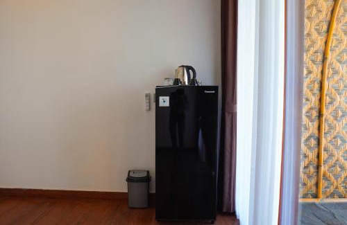 Songan Hotel | Pinggan Skyline