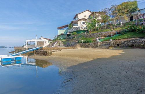 Caieira Casa | Piscina, caiaque e sauna em praia privativa