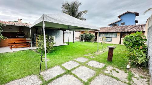 Manguinhos Casa | Piscina, Garagem, Praia e Conforto em Manguinhos