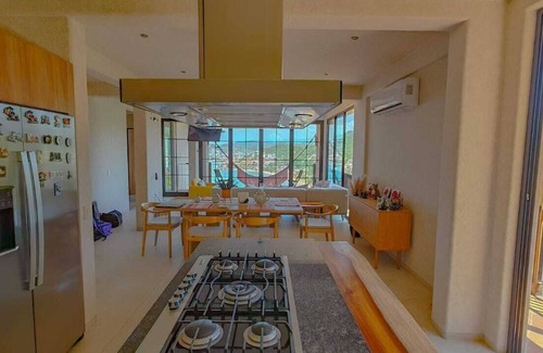 Cerro del Vigia Apartamento | PISCIS CONDOnDawn overlooking the most beautiful bay in Mexico.