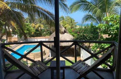 Tamarindos Apartamento | Playa Bruja Zicatela 2, 1er línea de playa, Cocina, A/C, Starlink, Alberca y más