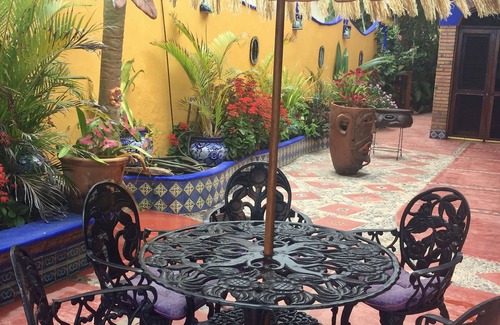 Los Ayala Apartamento | Playa Suite: Suite frente a la playa con patio privado en medio de jardines tropicales