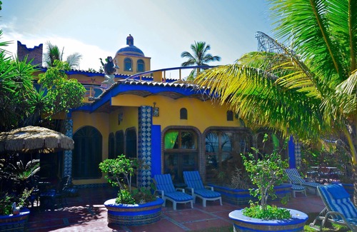 Los Ayala Apartamento | Playa Suite: Suite frente a la playa con patio privado en medio de jardines tropicales