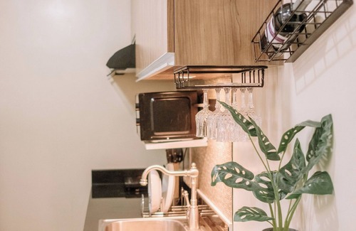 Mandurriao Condominio | Playful & Charming City Loft