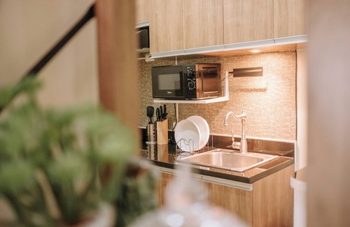 Mandurriao Condominio | Playful & Charming City Loft
