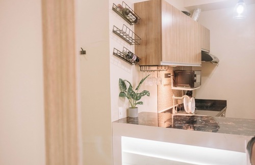Mandurriao Condominio | Playful & Charming City Loft