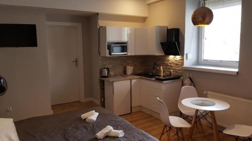 Gostynin Apartamento | Pokoje gościnne vis a vis Retro