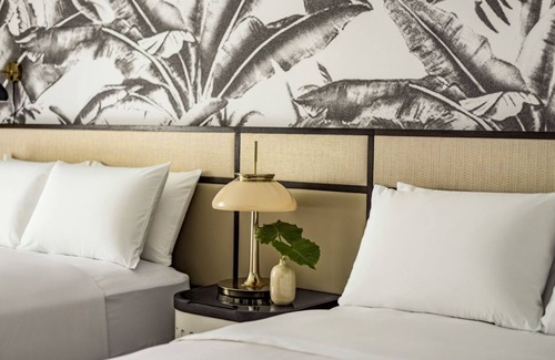 Hunt Club Hotel | Pool View Room Two Queen Room at PGA National Resort - Outdoor Fun!