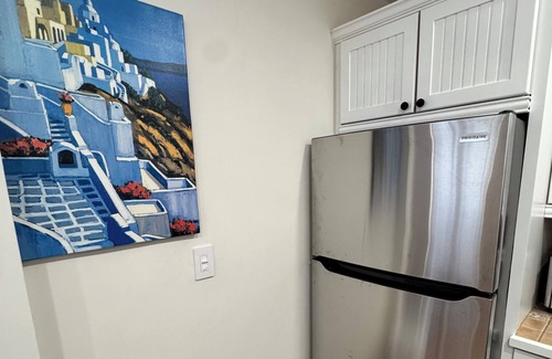 Harbor Village Condominio | Poolside 2BR Retreat Canal Dock 6 minutes Walk to the Beach