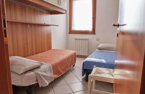 Rosapineta Apartamento | Poolside escape in Rosolina-Beahost