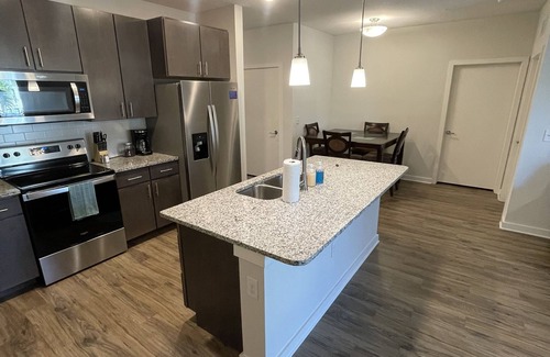 Deerwood Apartamento | Poolside Oasis for All with Endless Amenities