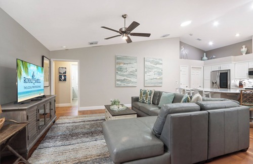 Cypress Lake Casa | Poolside Paradise is a luxurious modern home in the popular community of Parker Lakes