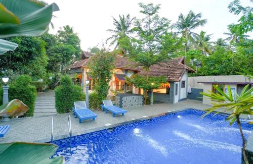 Kovalam Casa | Pop Tavern Kovalam Beach Villa by VOYE HOMES