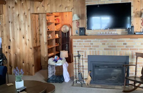 East Jordan Cabaña | Porter Estates Big Cabin is a private lake front cottage.