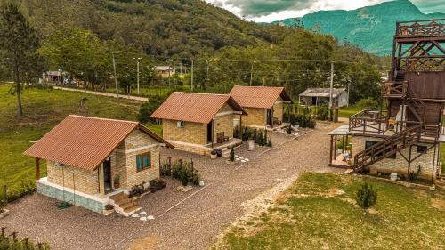 Praia Grande Casa | Pousada Caeana