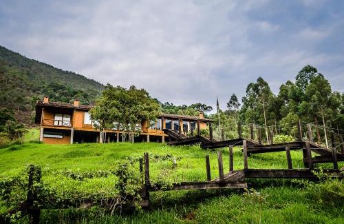 Passa Vinte Casa | Pousada Caminho dos Ipês