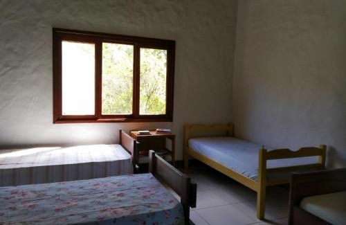 Passa Vinte Casa | Pousada Caminho dos Ipês