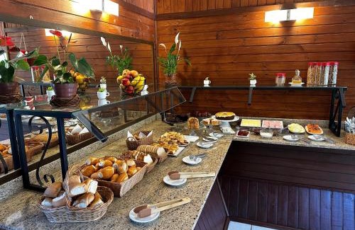 Vila Luiza Hotel | Pousada Canela Garden